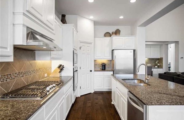 Knotty pine cabinets painted white