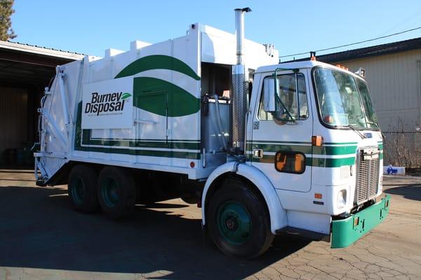 One of our beautiful trucks sunbathing in our Burney equipment yard.