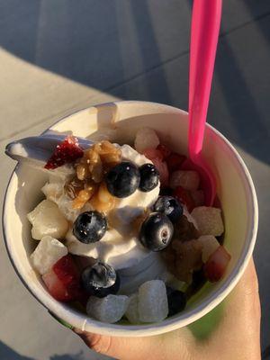 Almond based vanilla yogurt with syrupy pecans, blueberries, strawberries, and mochi