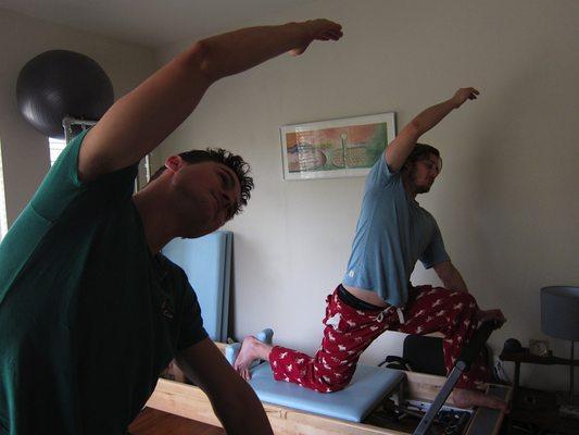 Pushing the table back stretches flexors tight from sitting.