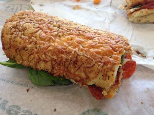 Sliced chicken, pepperoni, spinach, marinara sauce w/ mozzarella cheese on Italian herb and cheese bread