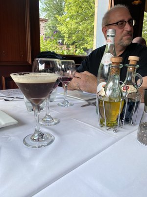 Espresso martini, wine and a water with gas