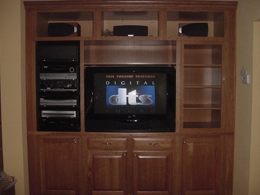 Costello job - Middle Atlantic roll-out equipment rack inside built-in custom cabinet.