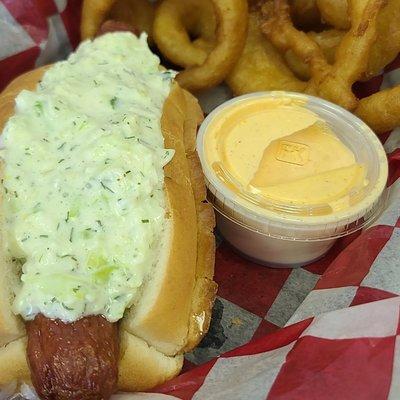 In house made slaw on one of our delicious hot dogs with a side ofdouble beer battered fries and Texas petal sauce