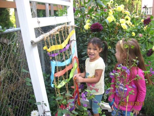 Weaving together on our garden loom.