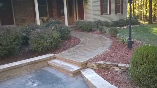 Parisian paver walkway with retaining walls