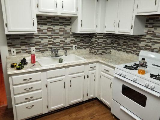 Backsplash and countertops installed