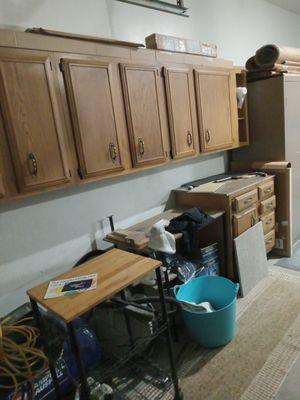 What do you do with your old kitchen cabinets after removal? Try Installing them in the garage. 20% off new customers only please.