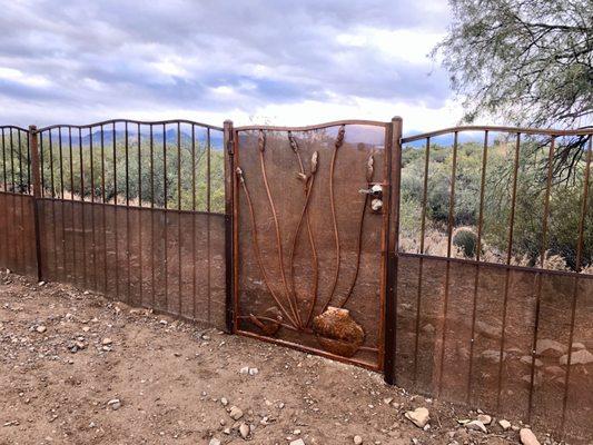 1 of the 3 gates in the fence they made and installed.