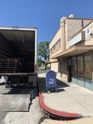 Illegally parked in red and blocked businesses, traffic and mailbox- even when delivery site has its own parking lot.