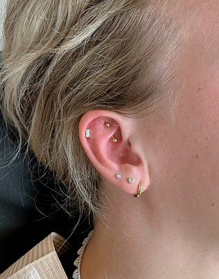 Rook and helix piercing