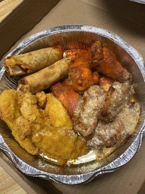 Appetizer sampler. Italian wings, buffalo wings, chicken tenders, and pizza lots (aka pizza egg rolls)