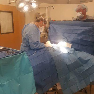 Dr. Schmelzer performing breast augmentation in our own accredited surgical suite.