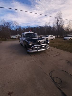 53 chevy turned into a police vehicle all interior done reverse camera touchscreen radio with sub and 6×9s looks good sounds good rides good