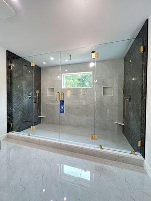 Large Shower with focal walls and Brushed Brass Hardware