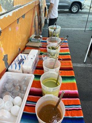 Fresh salsa, pickled carrots & cucumbers. Self serve, I like