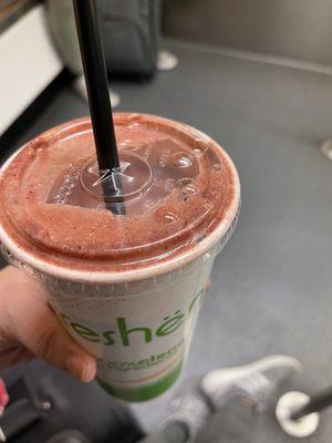 Açaí energy smoothie.  Kinda just tastes like juice even this I saw her out a bunch of fresh fruit in it