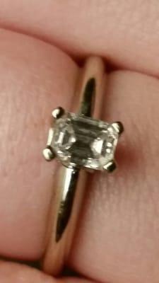 0.5 carat emerald cut diamond with white gold band