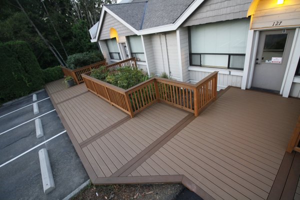 900 square foot deck rebuild. Trex "Enhance Basics" collection "Beach Dune" color with "Saddle" borders. 150 linear feet of railings.