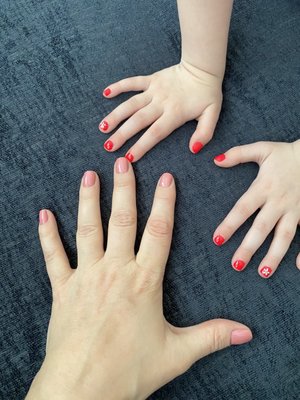 Mommy manicure and kid manicure with accent flower.