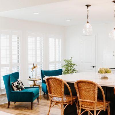 We replaced the kitchen table with seating at the huge island, and still had enough room for a sweet sitting area by the windows