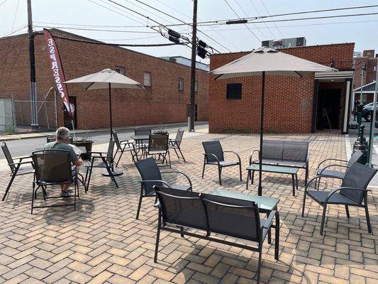 Patio out back with umbrellas!  Great sport to work or just grab coffee, breakfast, or lunch and enjoy the outdoors.