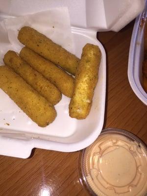 Cheese sticks (minus 1) with shrimp sauce!