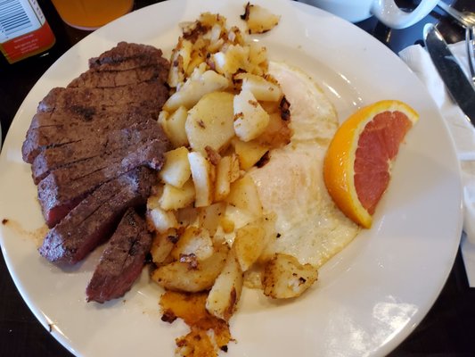 Steak and eggs  My steak came already cut.