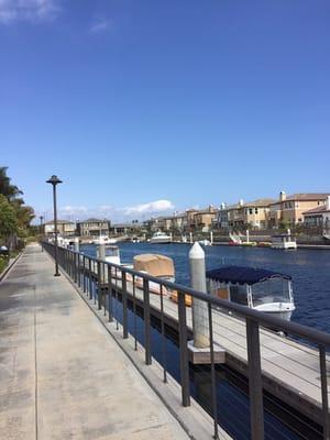 The beautiful walkways between luxury boat dock homes and the Channel Islands Harbor.