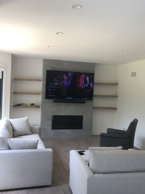 Tv mounting above the fireplace