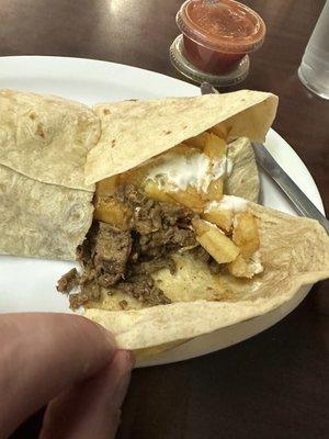 Generous portions of fries and carne asada