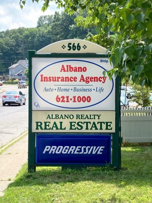 Outdoor Street Sign for Albano Agency Insurance & Real Estate featuring Progressive