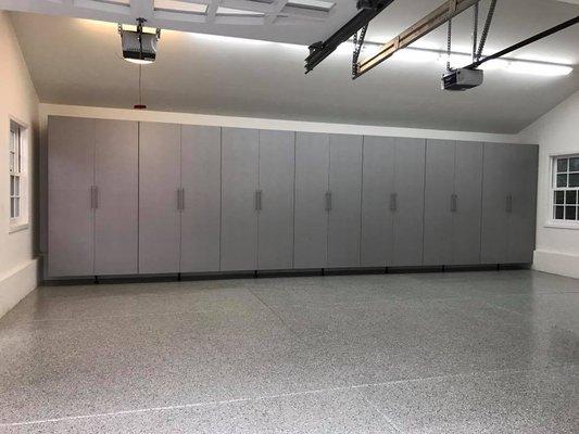 Built 7 garage cabinets with shelves in grey with white shelves.