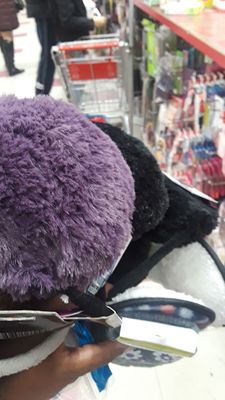 Getting my 79 and 99 cents earmuffs on at Lucky 99 Cents.