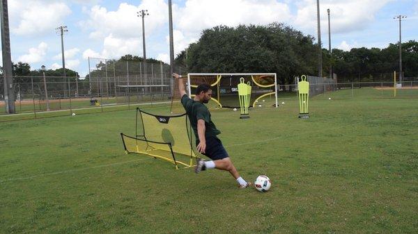 coach iko working on drills for his players to exceed!