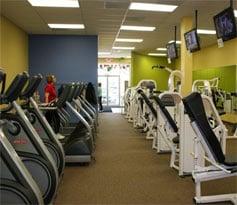 PTI interior photo showing cardio vascular and strength training equipment