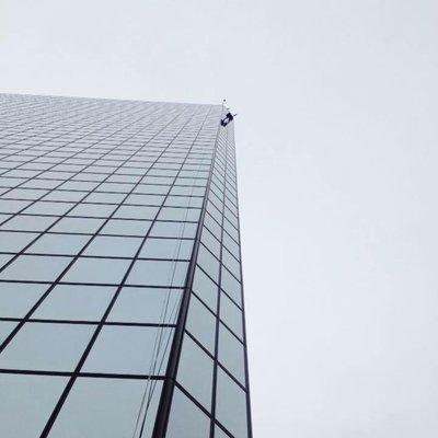 Commercial window washing of a high rise building in downtown Anchorage.