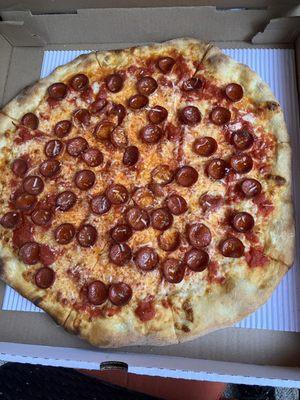 Red pie with pepperoni.