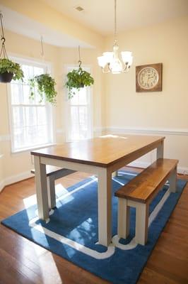 6' Farmhouse Table. Solid Wood table with two matching benches. Top is stained Early American with Spiced Vinegar Base.