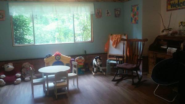 Art easel, rocking chair, rocking horse and door toy.