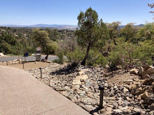 Drainage ditches lined with rock to match our native rock, plus new lighting