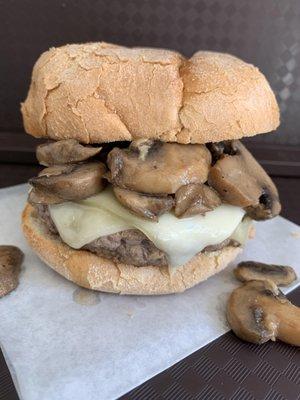 MUSHROOM SWISS BURGER-1/3 lb Angus Beef Patty topped with Swiss cheese and fresh mushrooms sautéed in our savory red wine sauce.