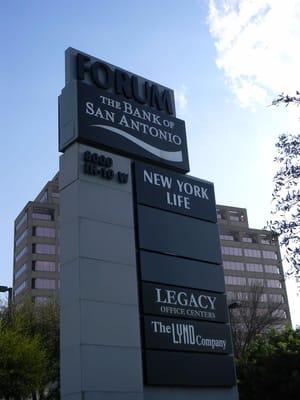 When you reach 8000 W Interstate 10, turn right at the Forum Building Sign.