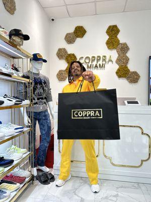 Rohan Marley shopping at coppra Miami