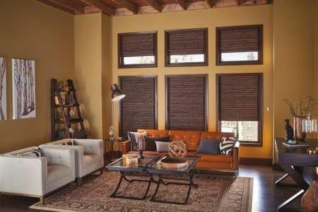 Transform your living room into a natural oasis with our stunning Signature Series Woven Wood Shades...