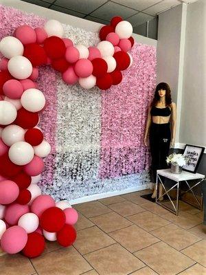 Reception area, with funky mannequin & falling (?) balloons