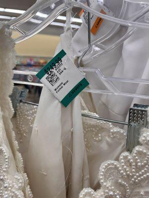 $250 for a busted up, snagged, stained wedding dress from the 90s