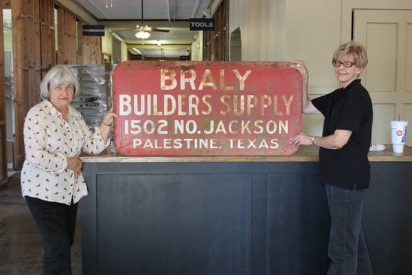 Here are our 3rd generation ladies (Margie and Martha Braly) holding a sign that we found today behind the barn at Neual's house.