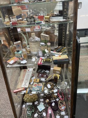 Glass case with items