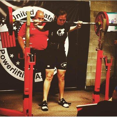 Trainer Megan competing at a USPA Powerlifting Competition where she placed 1st if her division setting state records